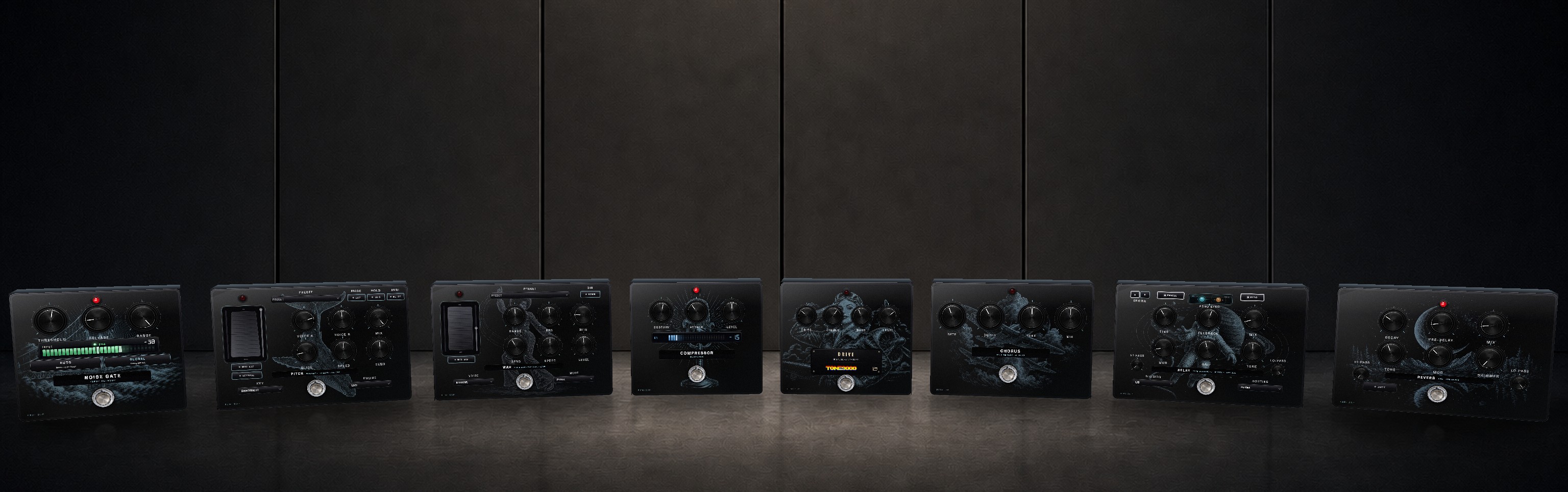 The six black-glass pedals — noise gate, compressor, drive, chorus, delay and reverb — standing together on the studio floor